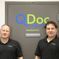 Dr. Norman Silver and David Berkowits at the QDoc office in Winnipeg, MB