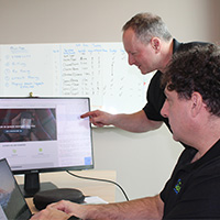 Dr. Norman Silver and David Berkowits working on the QDoc platform