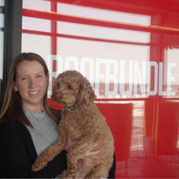 Sydney Gilchrist (RoofBundle Administration) and Remi, their cute, furry friend.
